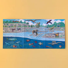 Load image into Gallery viewer, sticker-activity-book-dinos-with-a-t-rex-prehistoric-fish-plants-panel-with-stickers-applied