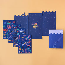 Load image into Gallery viewer, sticker-activity-book-under-the-sea-cover-with-a-whale-two-snorklers-fish-coral-under-the-sea-4-sticker-packs