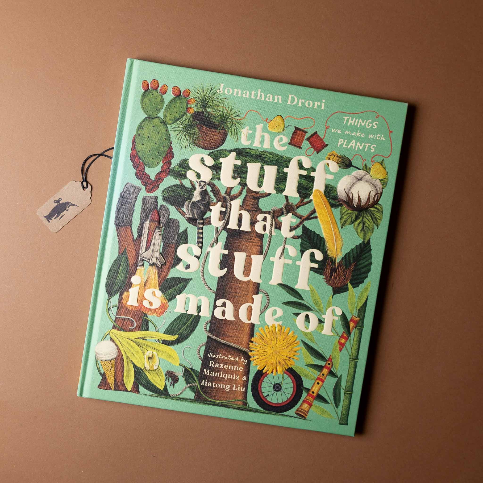 Book titled 'the stuff that stuff is made of' with illustrations on a brown background