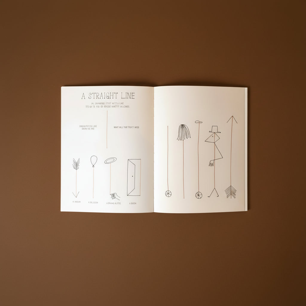 take-a-line-for-a-walk- Open book with line drawings on a brown background