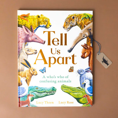 tell-us-apart-a-whos-who-of-confusing-animals-book-cover-with-similar-animals-such-as-aardvark-and-anteater-on-opposing-sides