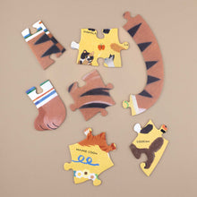 Load image into Gallery viewer, pieces of A to Z of Cats 58 piece Puzzle, a puzzle shaped like a cat