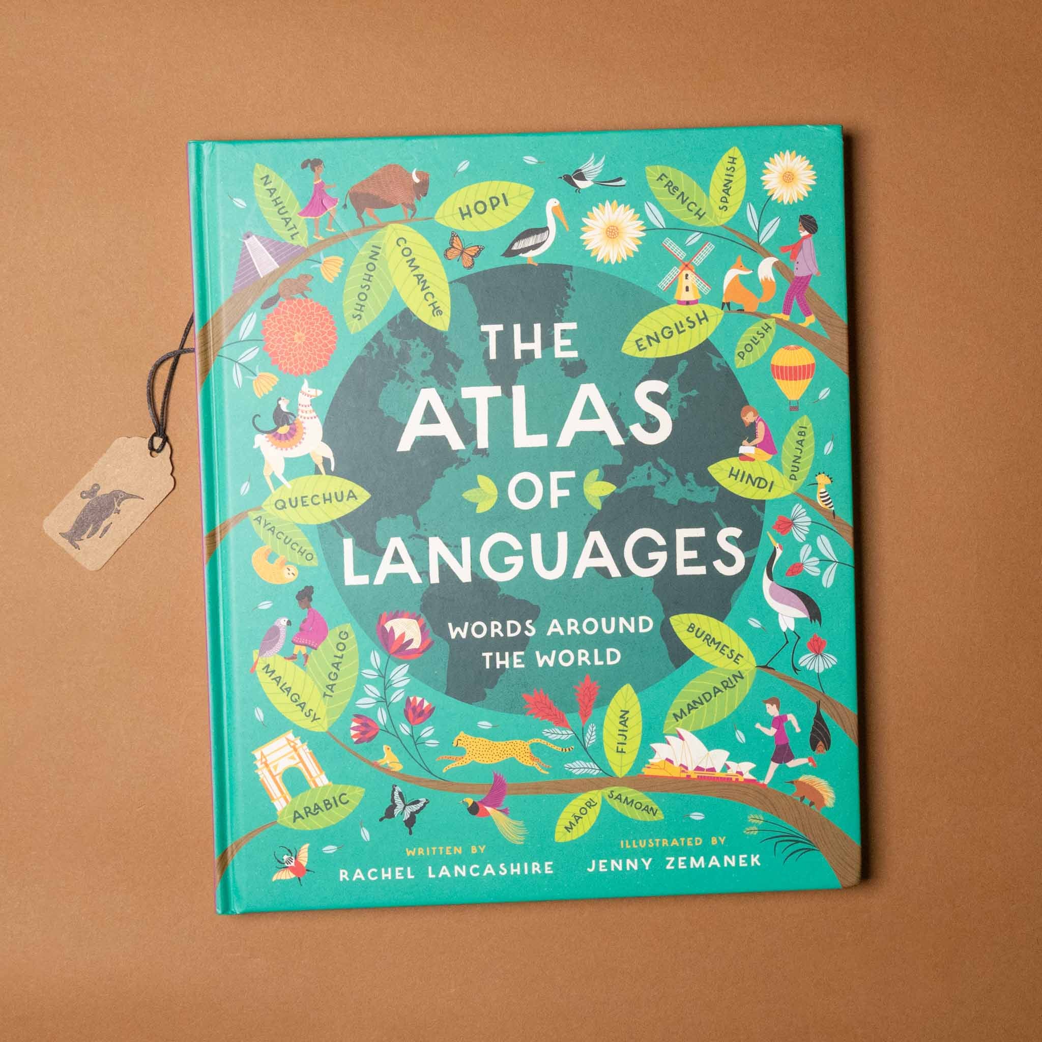 the-atlas-of-languages-cover-with-earth-surrounded-by-a-tree-with-leaves-of-languages