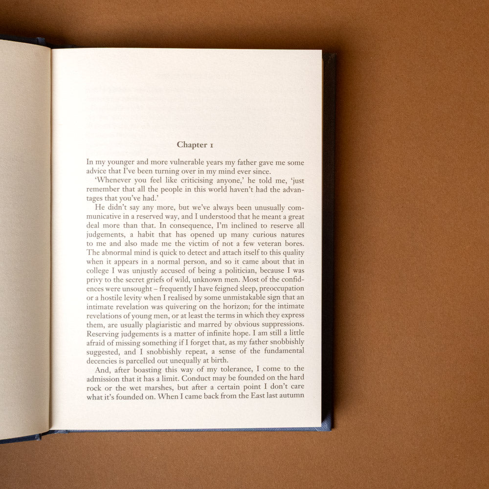 the-great-gatsby Open book with text on a brown background