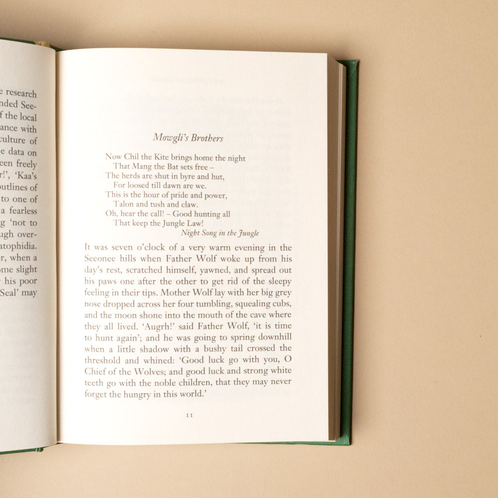 the-jungle-book Open book with text on a beige background