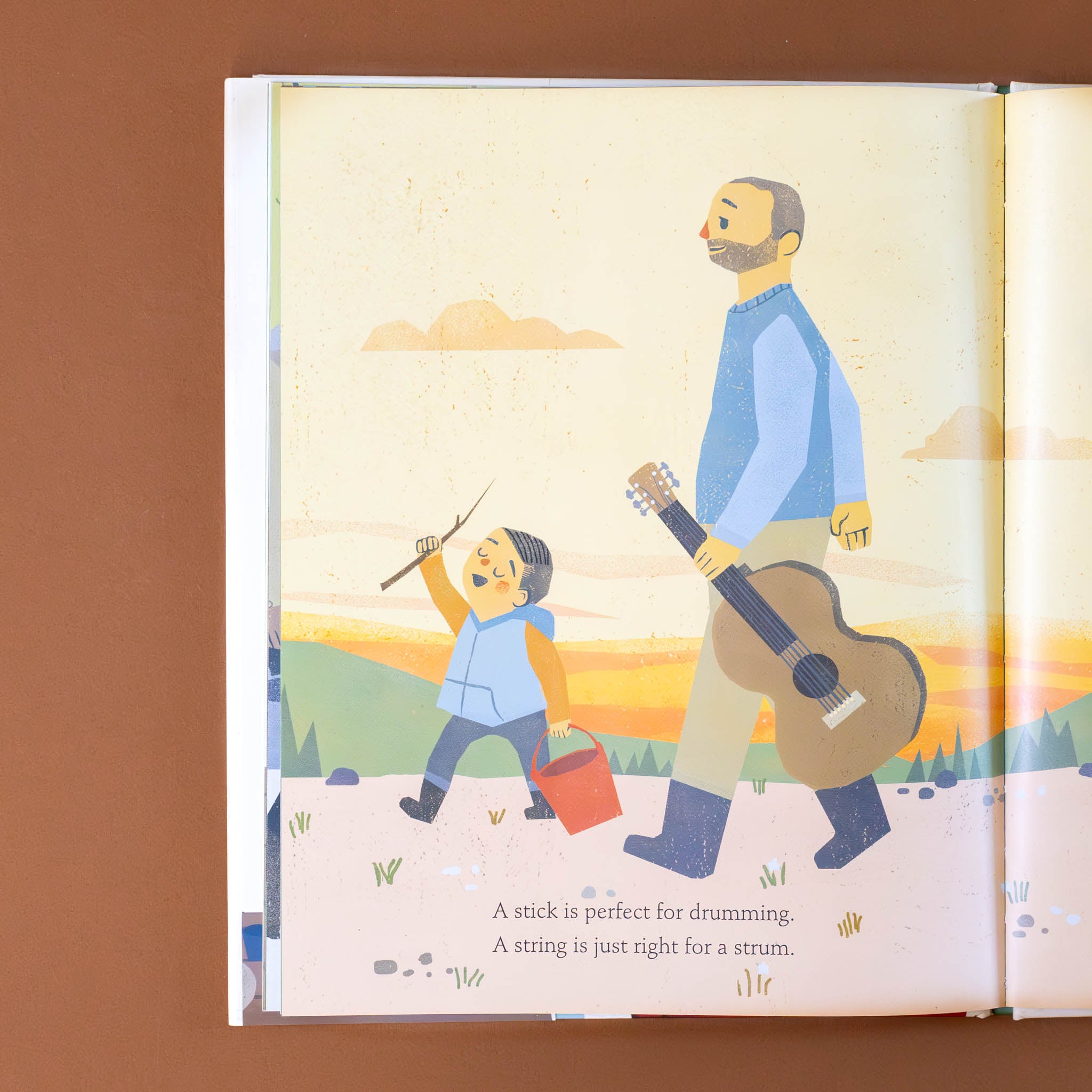 the-sharing-book-showing-a-child-and-dad-walking-with-instruments-and-how-they-are-perfect-for-playing