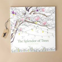 Load image into Gallery viewer, the-splendor-of-trees-coloring-book-cover-with-a-magnolia-tree-blossoming-and-covered-in-strings-of-lights