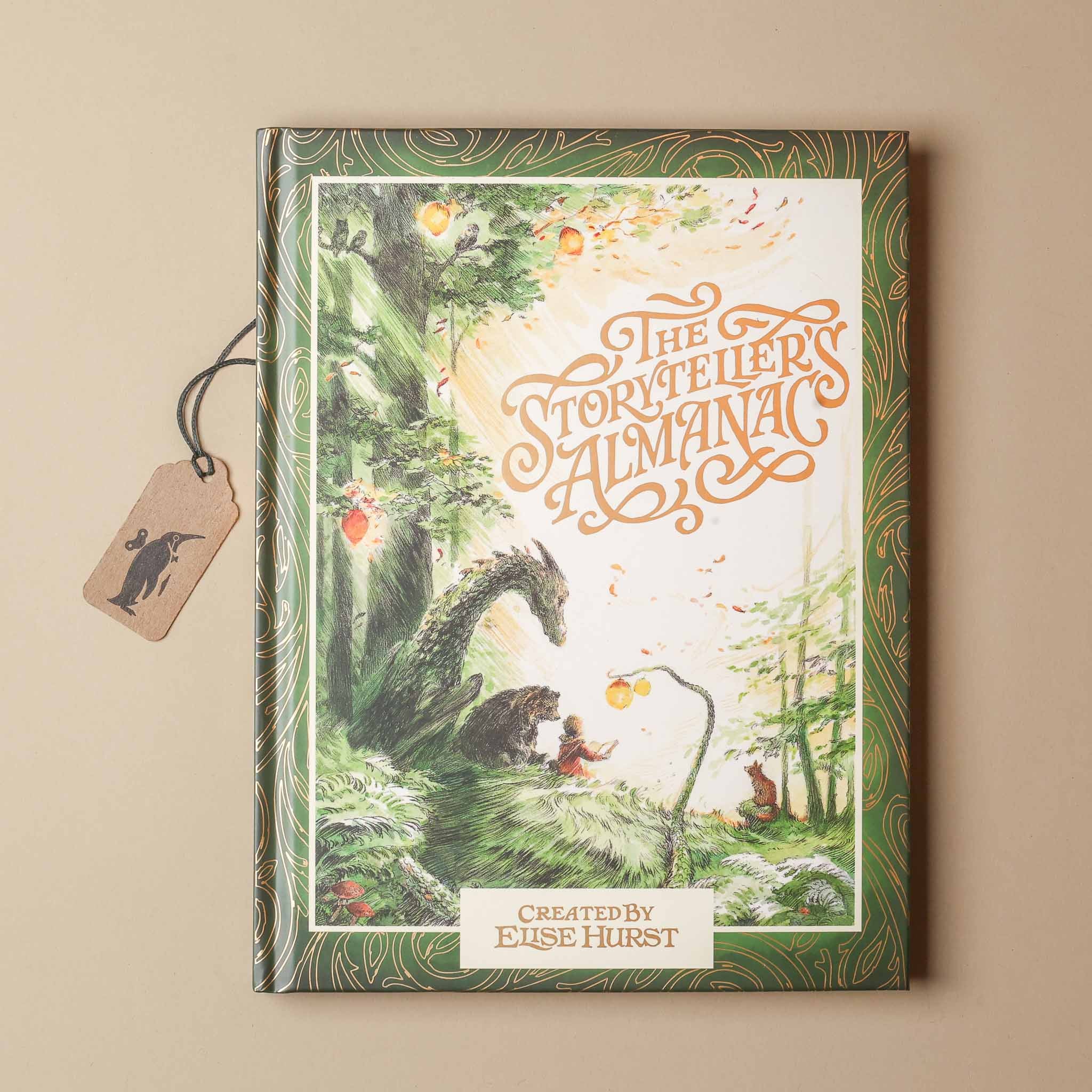 Book titled 'The Storyteller's Almanac' with a forest illustration on the cover, featuring Elsie Hurst's name.