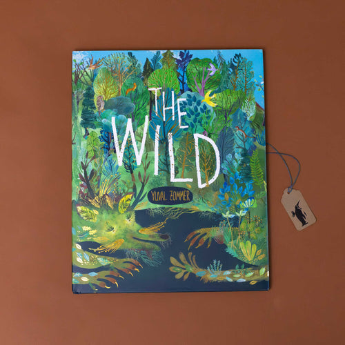 the-wild-book-with-a-beautiful-green-forest-scene-on-the-front-with-animals-appearing-from-the-imagery
