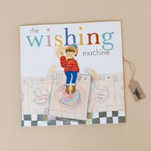 Load image into Gallery viewer, the-wishing-machine-book-with-a-child-atop-a-washing-machine
