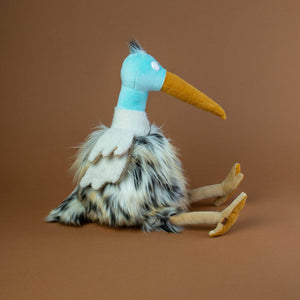 side-view-of-blue-headed-bird-stuffed-animal