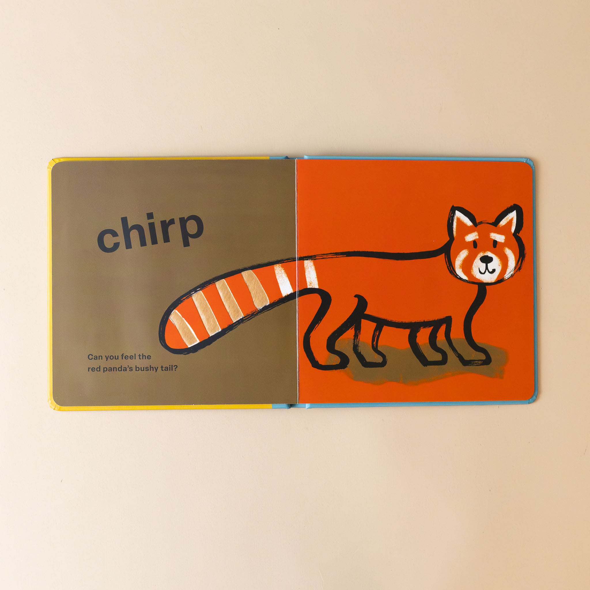 touch-and-feel-board-book-wild-interior-page-with-red-panda-and-text-chirp