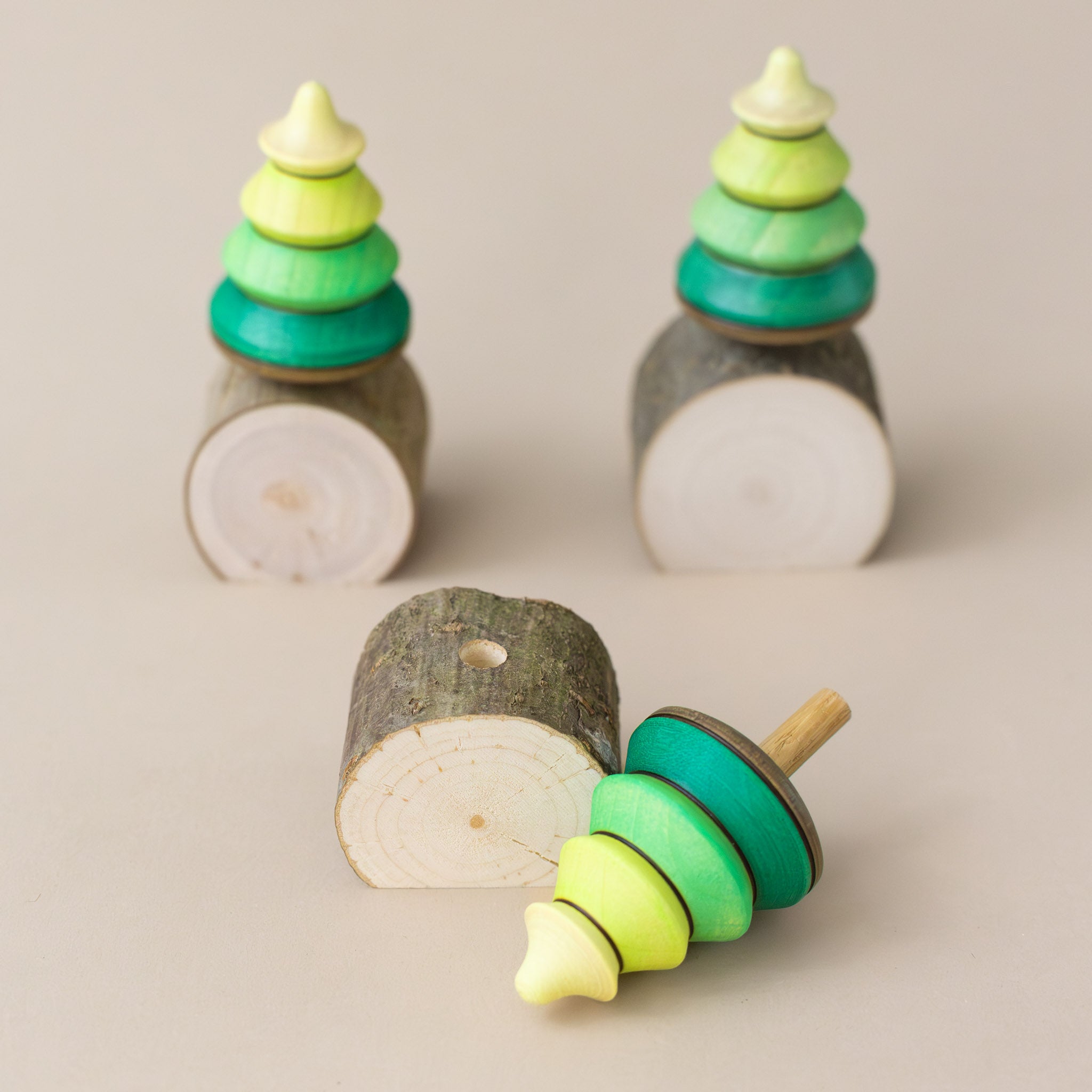 tree-wooden-spinning-top-green-ombre-coloring-and-wooden-base