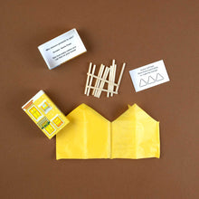 Load image into Gallery viewer, components-showing-joke-matchstick-puzzle-and-orange-paper-hat-housed-within-yellow-holiday-home-matchsitck-box