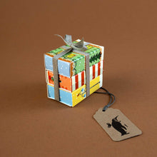 Load image into Gallery viewer, village-matchstick-puzzle-set-jolly-tied-in-a-ribbon