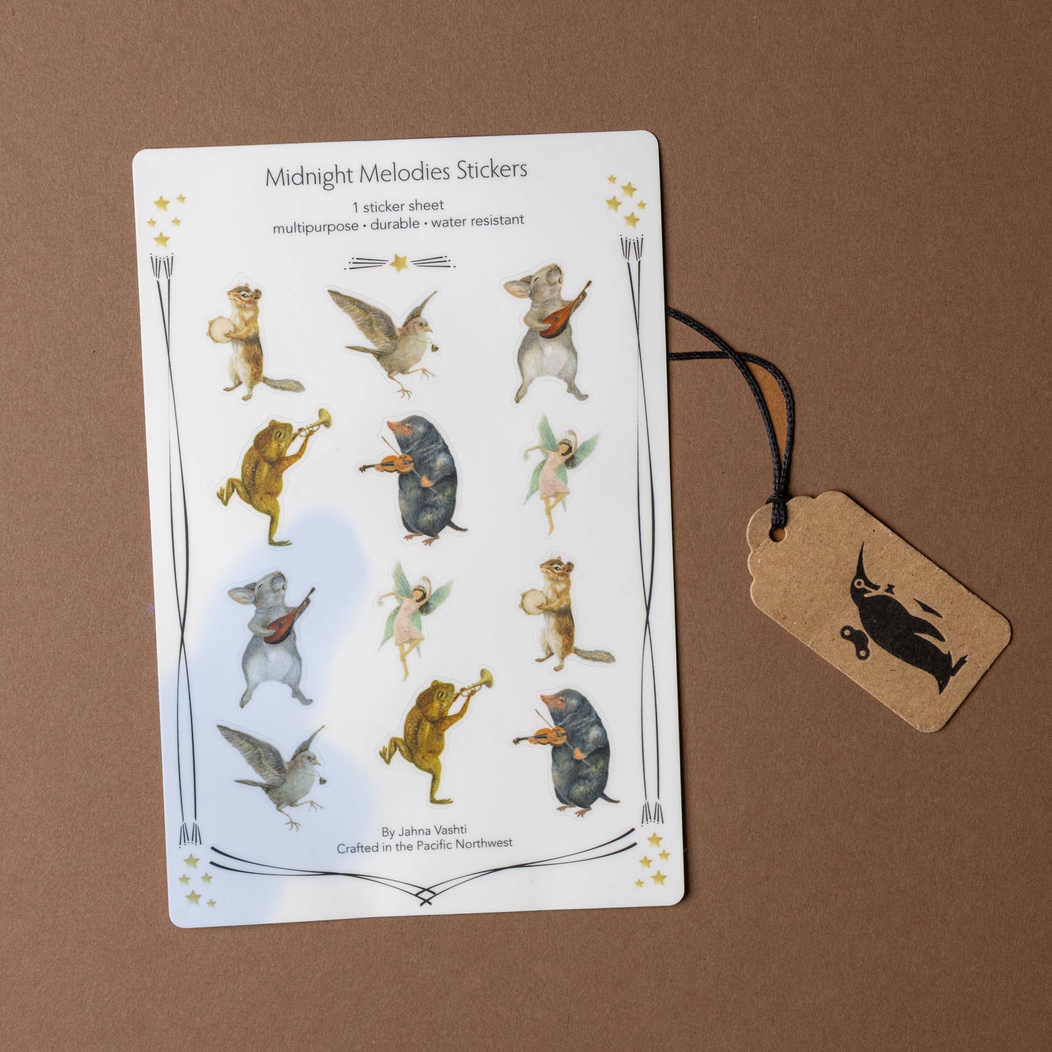 Sheet of Midnight Melodies stickers with animal illustrations on a brown background