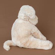 Load image into Gallery viewer, sandy-colored-wanderlust-puppy-stuffed-animal-curled-tail