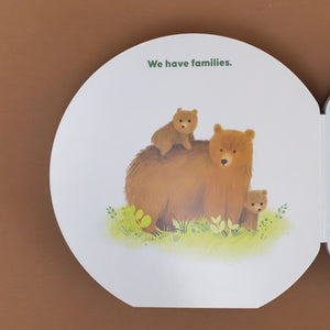 a-mother-bear-and-two-cubs-with-we-have-families-text
