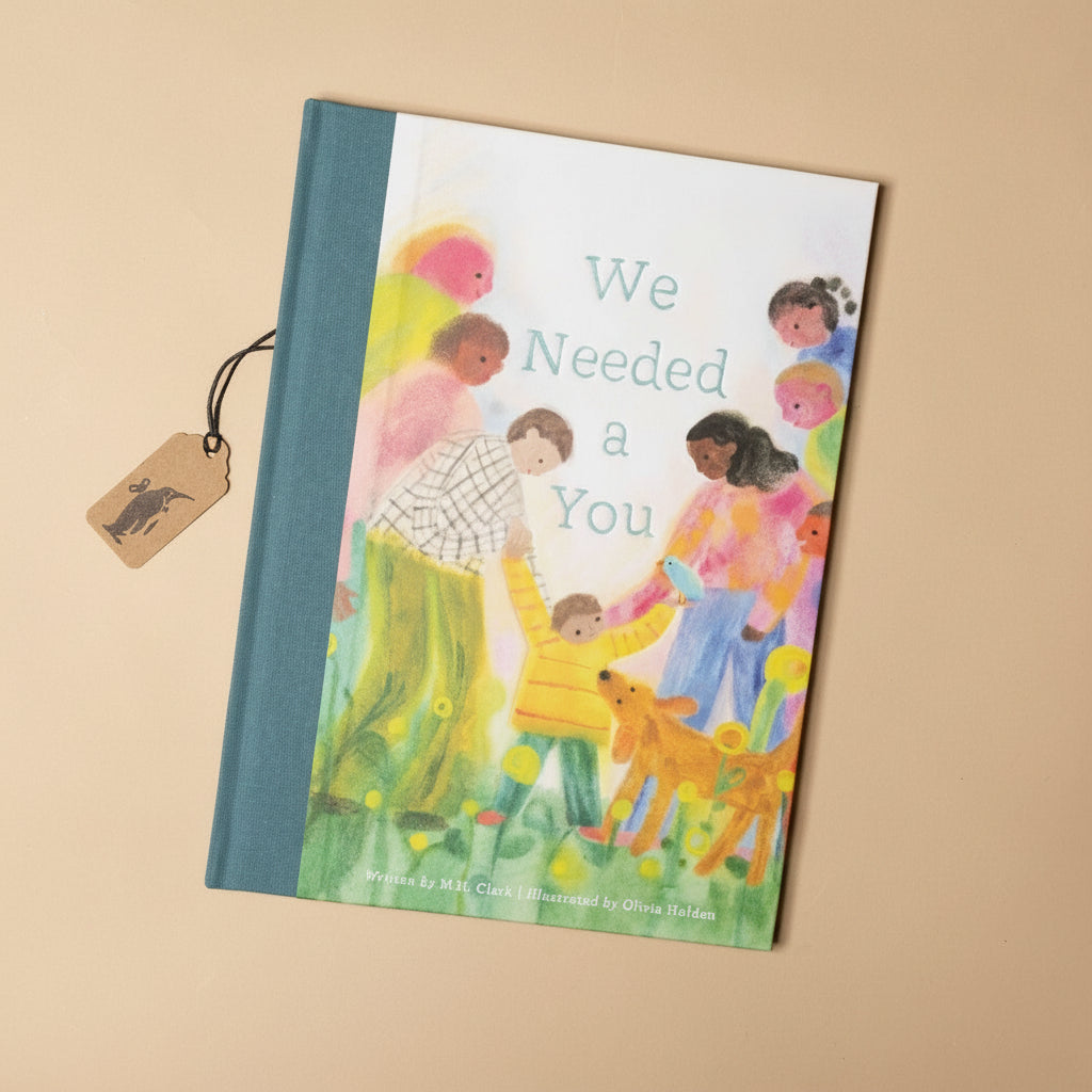 we-needed-a-you-book-with-family-holding-a-little-ones-hands