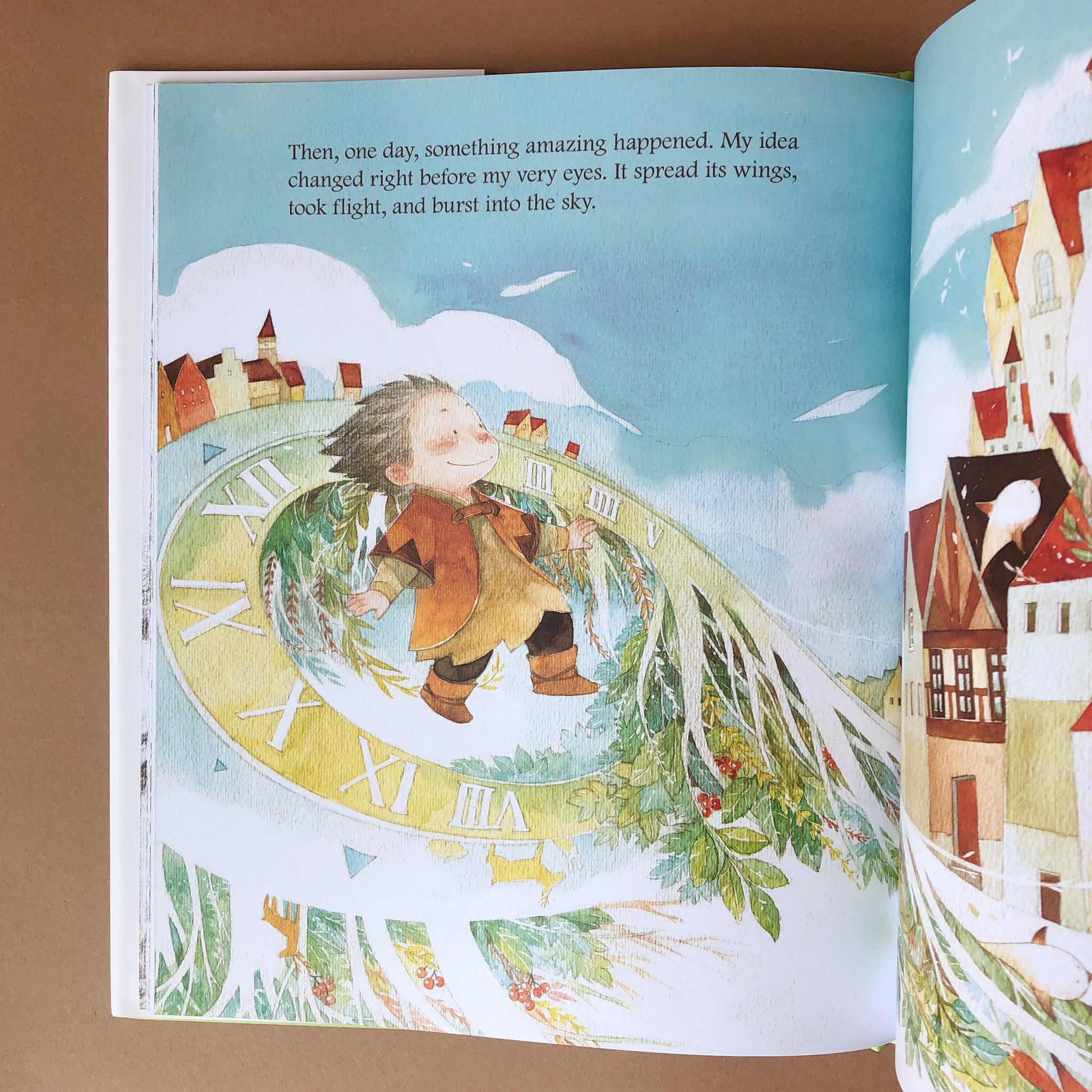 what-do-you-do-with-an-idea-book-and-egg Illustrated book page with a child and clock design on a brown background