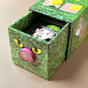 Green box with eyes and a nose-pull of Hide & Seek Memory Game