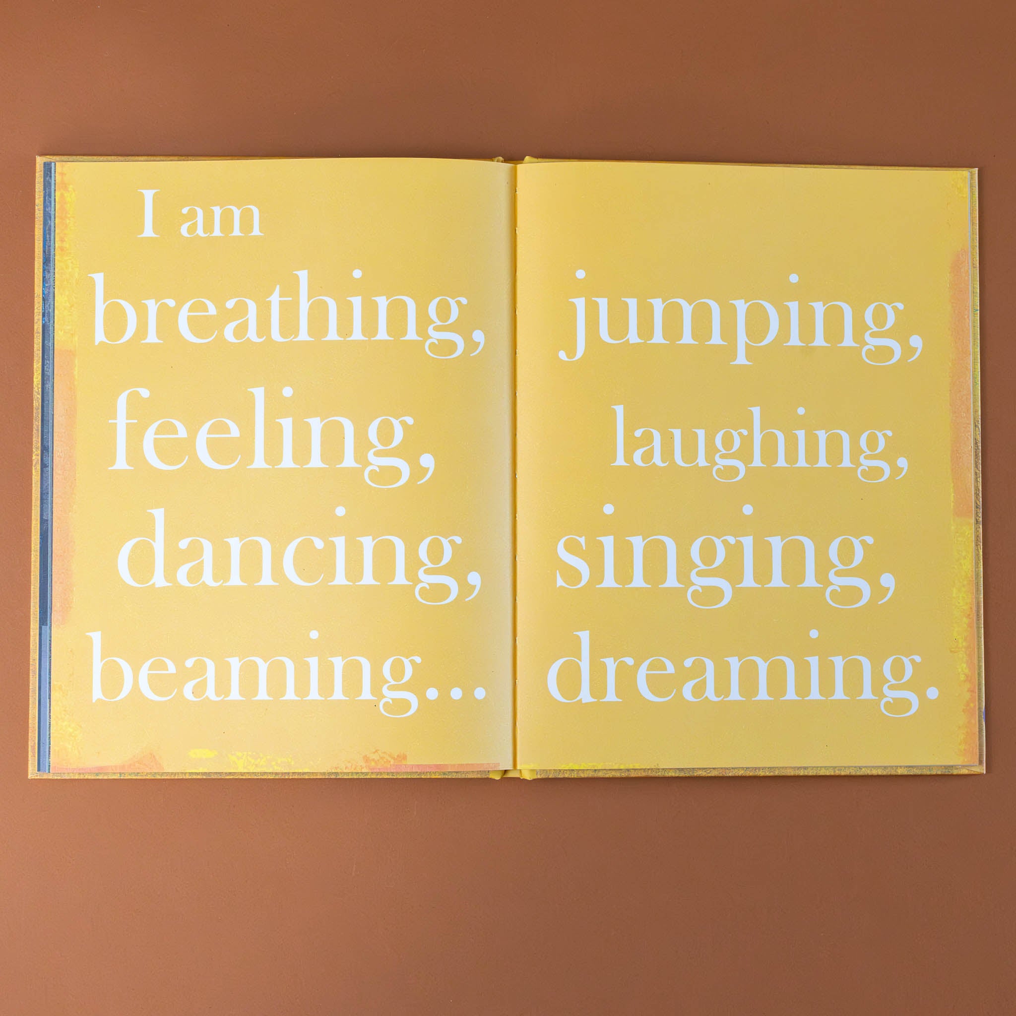 interior-pages-with-words-i-am-breathing-feeling-dancing-beaming-jumping-laughing-singing-dreaming-on-yellow-background