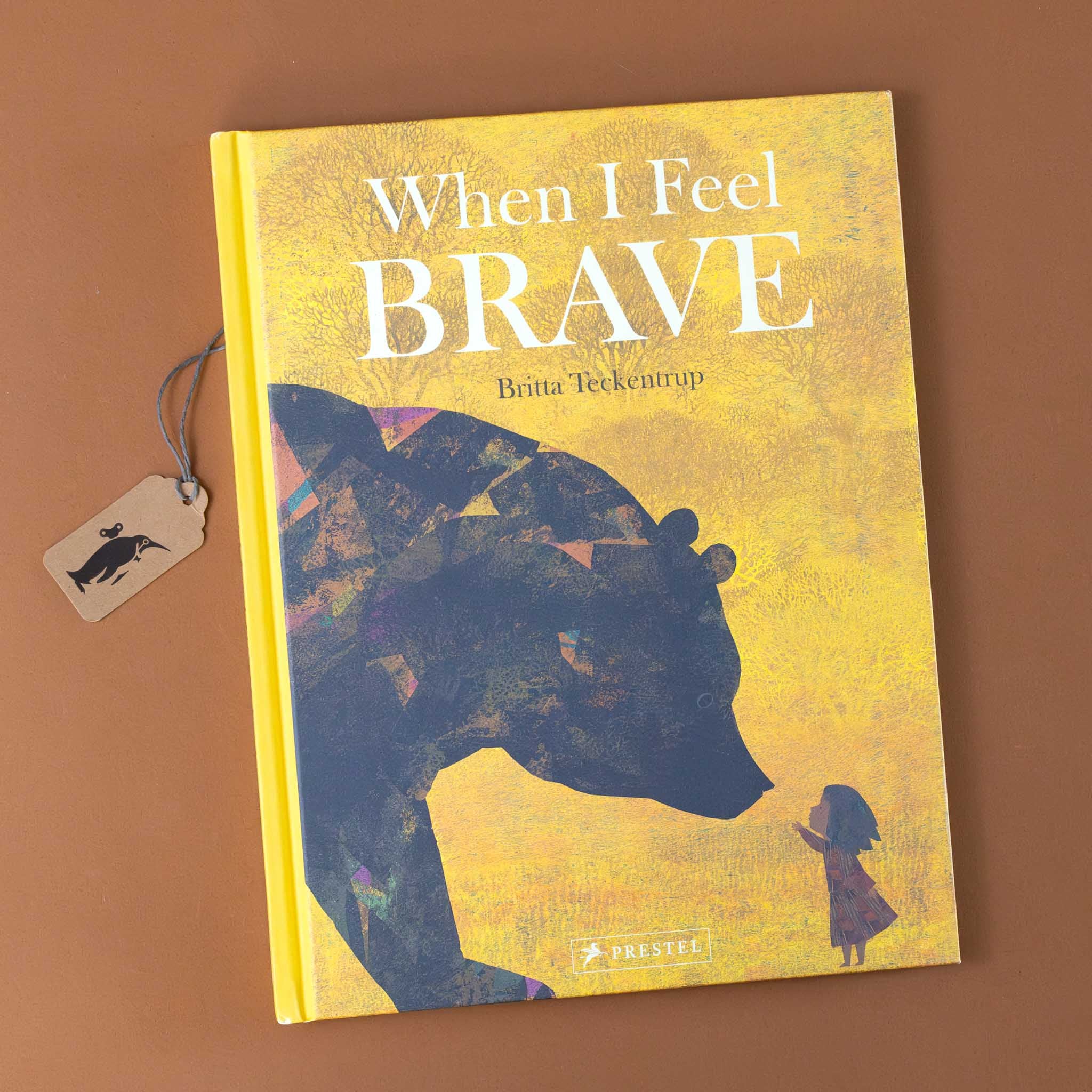 when-i-feel-brave-book-yellow-cover-with-a-little-girl-greeting-a-bear