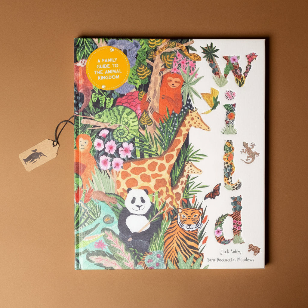 wild-a-family-guide-to-the-animal-kingdom-cover-with-panda-tiger-giraffe-and-other-animals