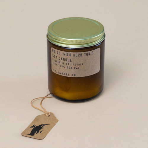 wild-herb-tonic-candle-with-amber-apothecary-glass-container-and-brass-lid