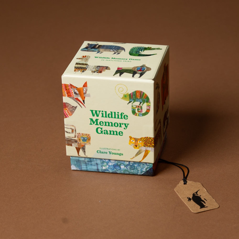 Box of Wildlife Memory Game with animal illustrations on a brown background