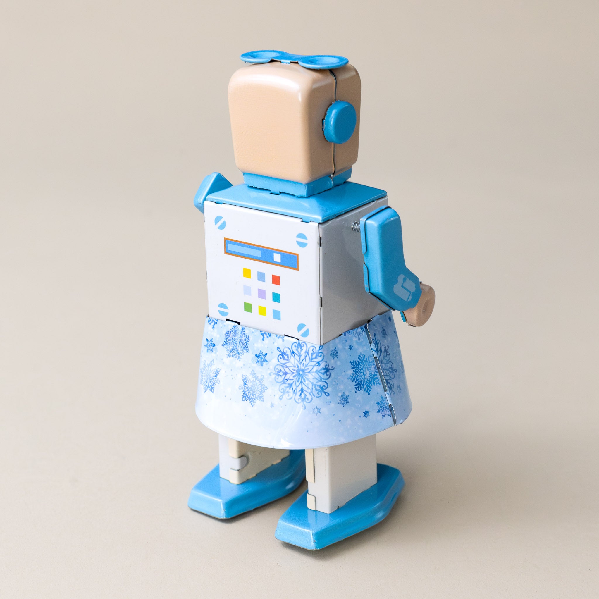 wind-up-tin-snowbot-blue dress-shoes-and-bow-with-snowflake-details-back