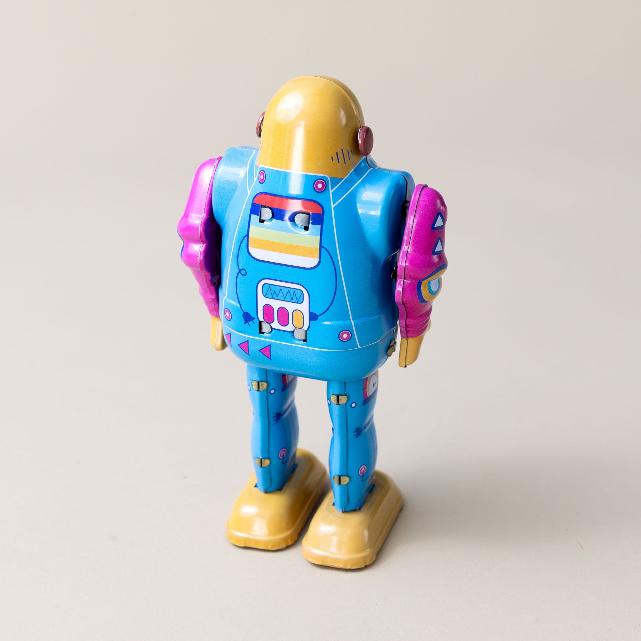 wind-up-tin-telebot-with-blue-body-and-magenta-arms-and-colorful-screen