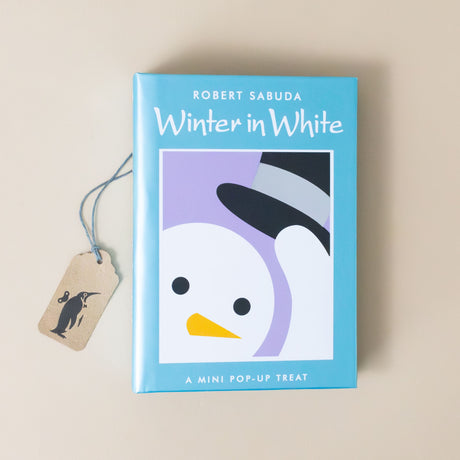 winter-in-white-book-cover-with-snowman-tipping-top-hat