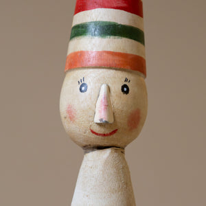 hand-painted-face-of-carved-wood-elf