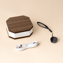 Load image into Gallery viewer, wooden-accordion-light-walnut-closed-with-usb-cable-and-lanyard