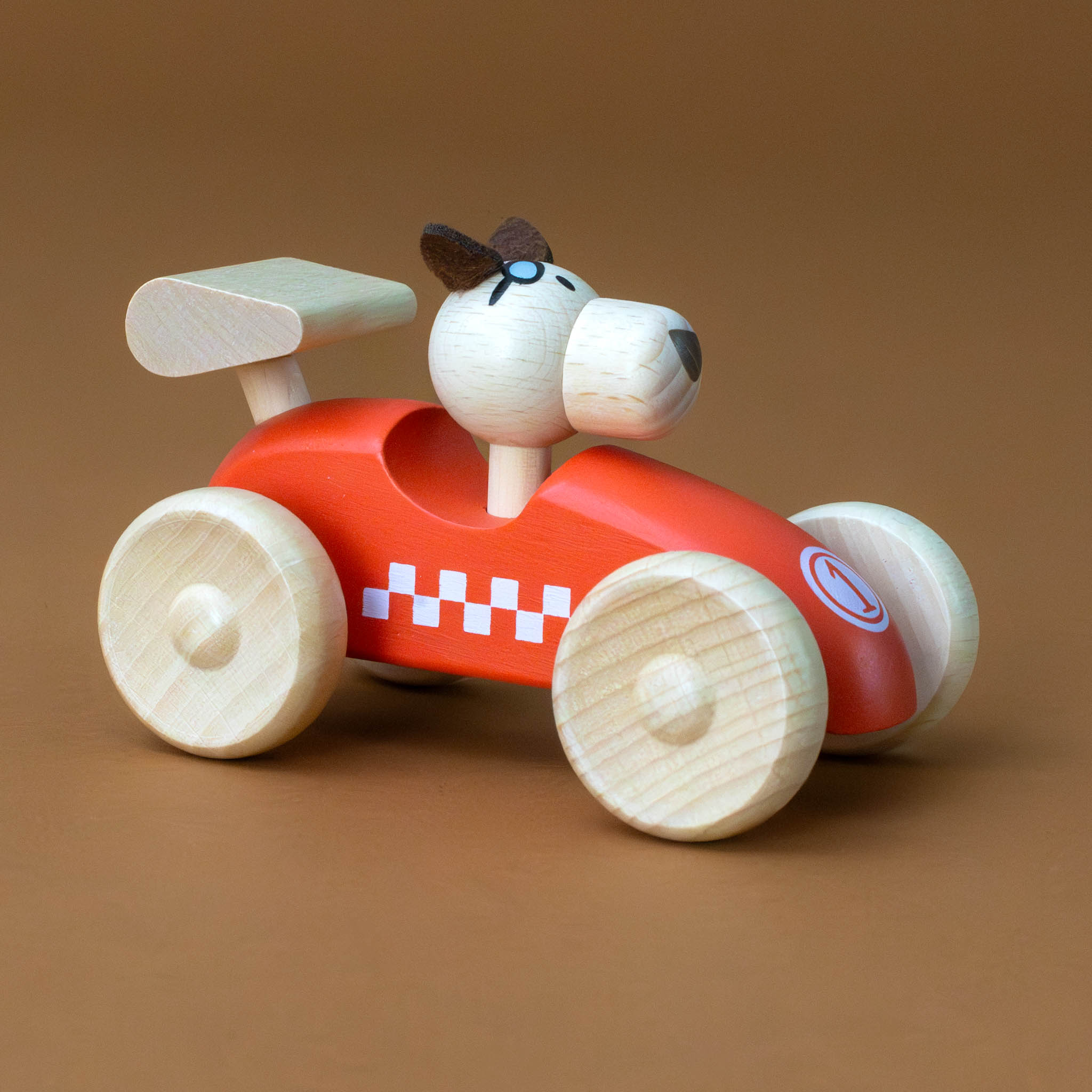 wooden-red-racer-car-with-dog-driver-with-flappy-brown-felt-ears