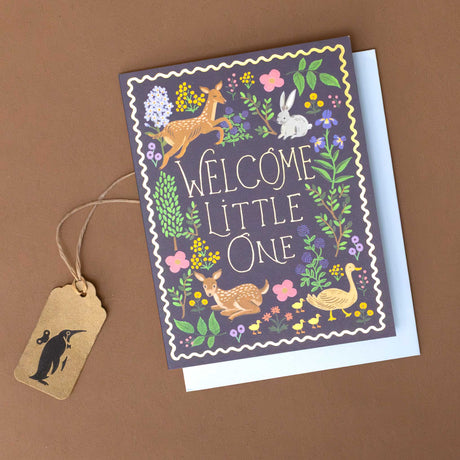 woodland-creatures-flora-and-fauna-on-navy-background-with-gold-foil-welcome-little-one-greeting-card