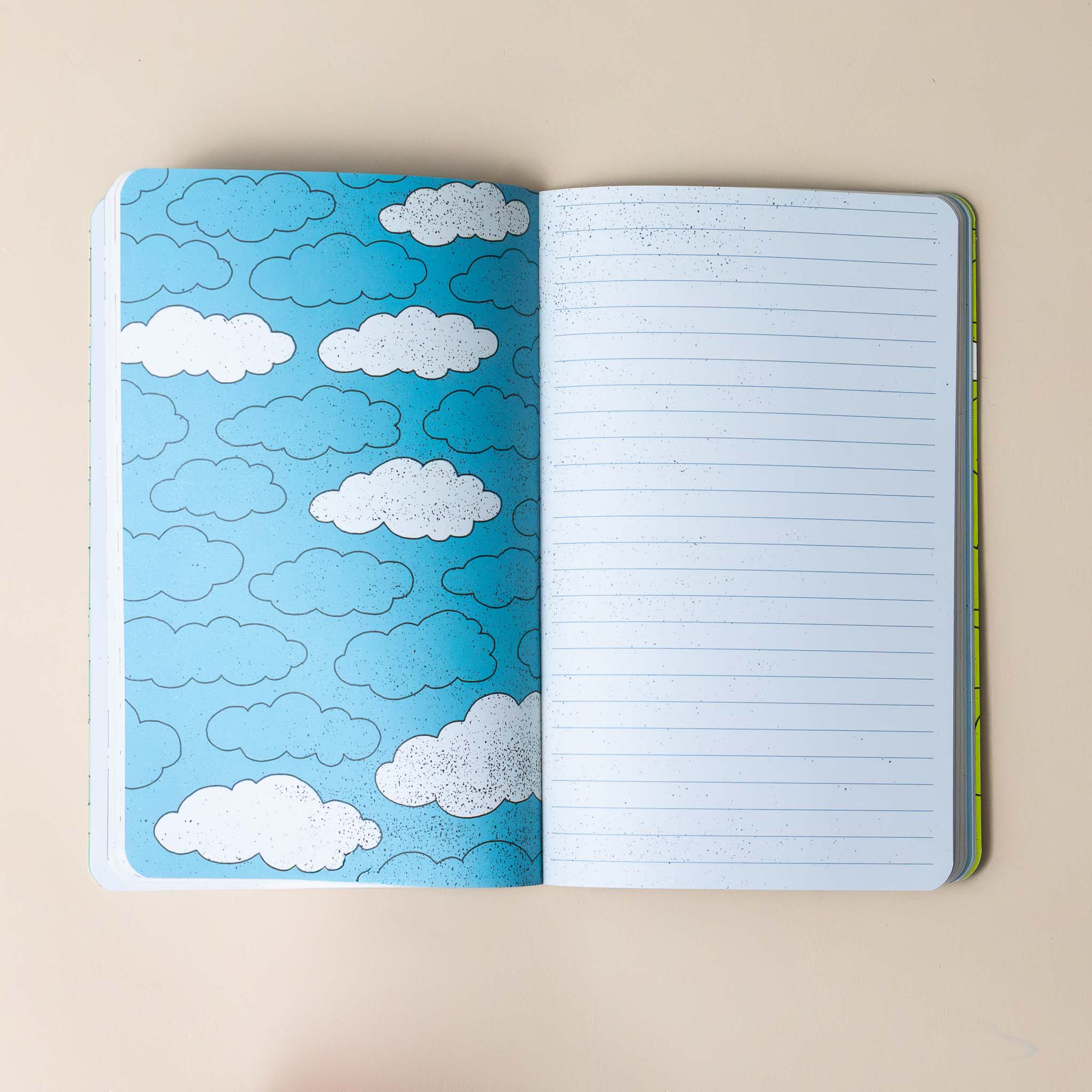 interior-pages-with-lined-sheet-and-illustration-on-accompaning-page-of-blue-sky-and-clouds