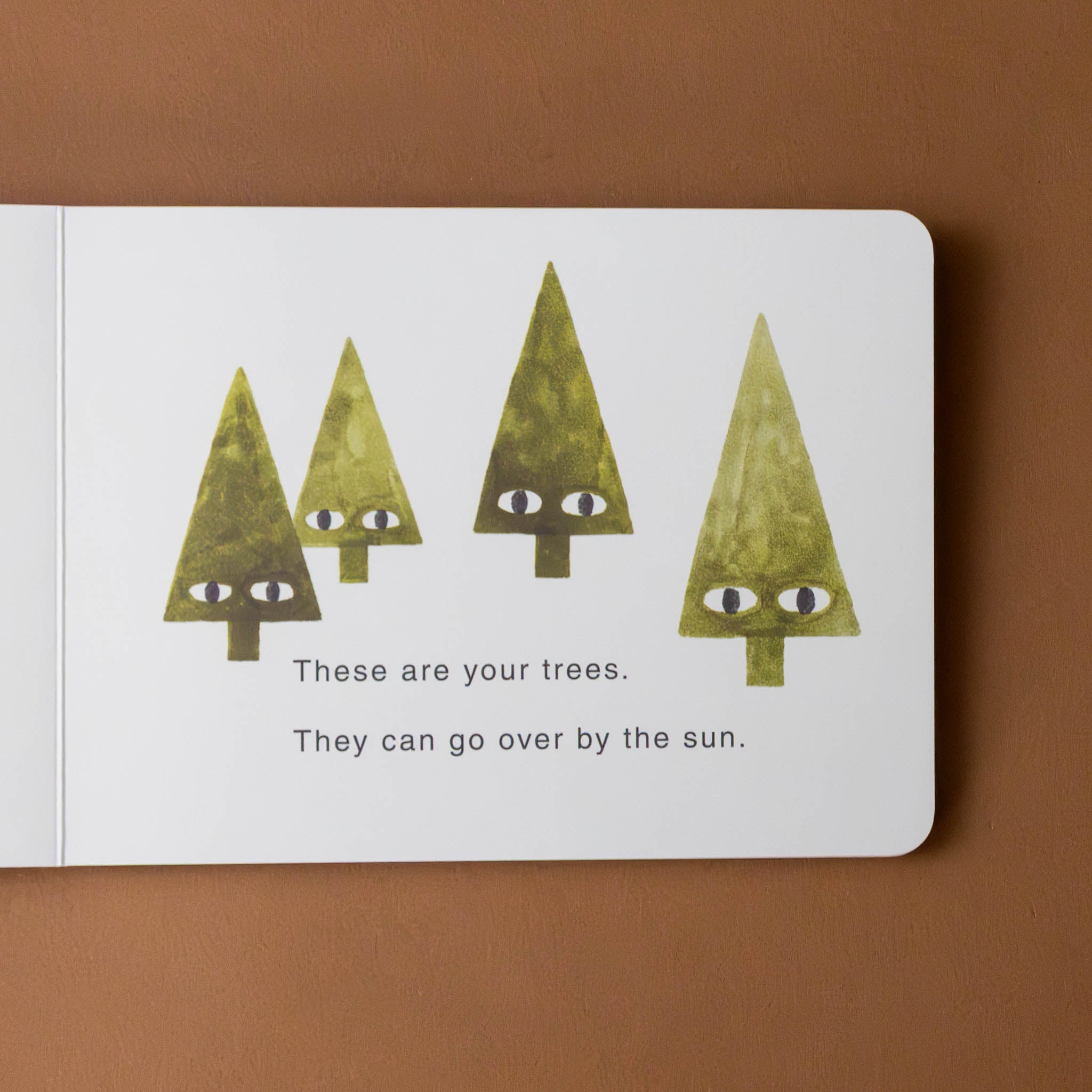 your-forest-board-book-interior-page-with-pine-trees-and-text-these-are-your-trees-they-can-go-over-by-the-sun
