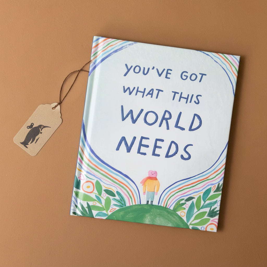 youve-got-what-the-world-needs-cover-with-a=person-standing-on-top-of-a-hill-with-radiating-energy