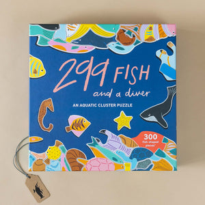 299-fish-and-a-diver-puzzle-box-with-illustrated-fish-on-blue-background