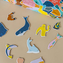 Load image into Gallery viewer, close-up-of-shaped-fish-puzzle-pieces