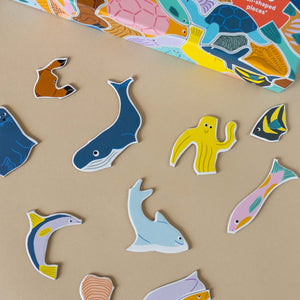 close-up-of-shaped-fish-puzzle-pieces