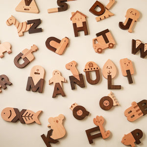 manuli-written-in-wooden-blocks-and-additions