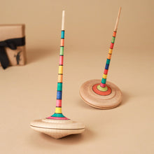 Load image into Gallery viewer, wooden-top-with-long-rainbow-striped-handle