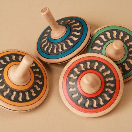 wooden-carved-spinning-top-different-colors