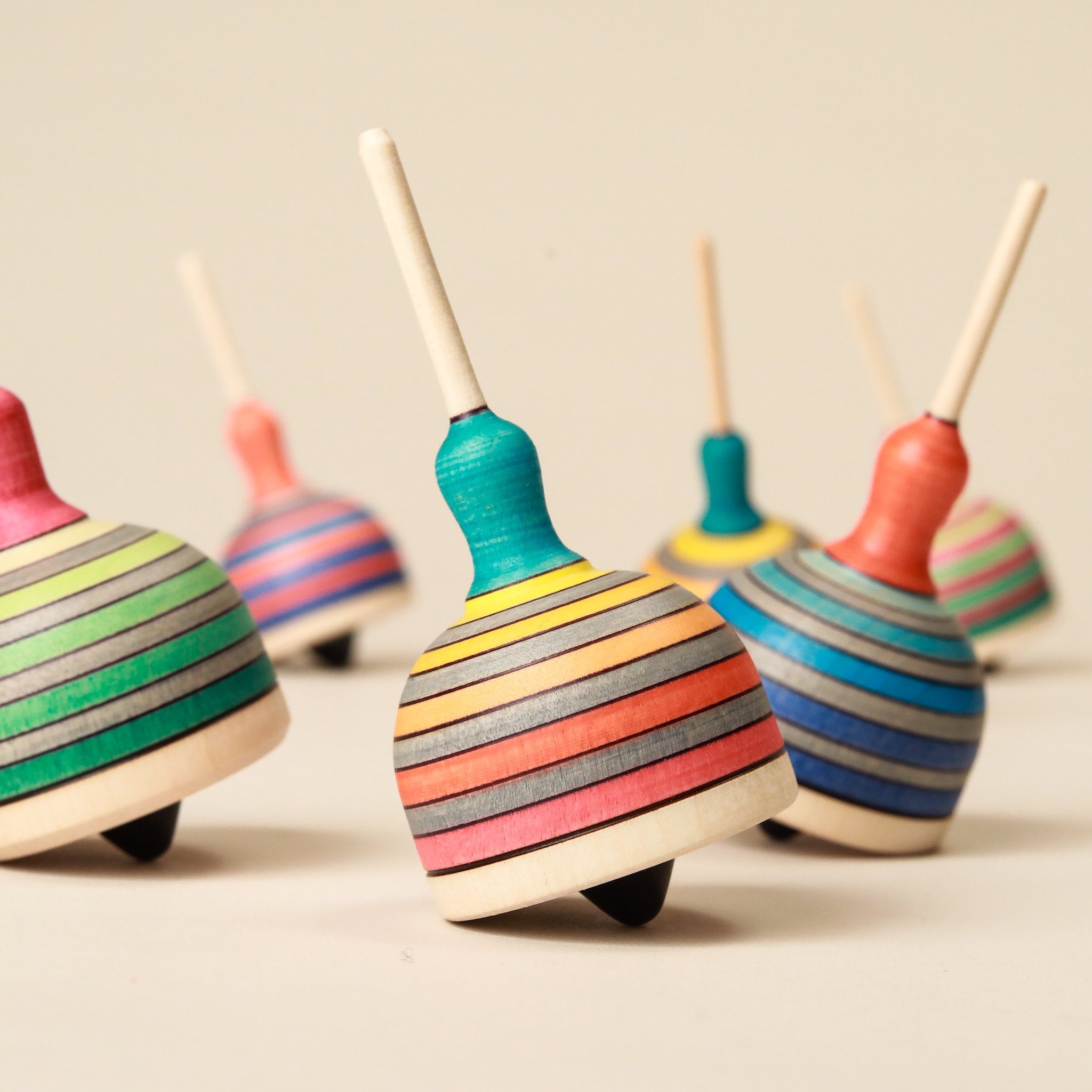 striped-colorful-wooden-tops