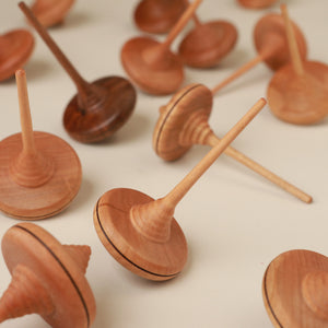 many-spinning-tops-scattered
