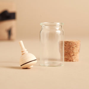 light-wood-top-next-to-glass-jar