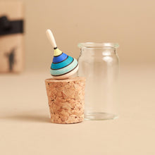 Load image into Gallery viewer, blue-striped-top-on-cork-next-to-glass-jar